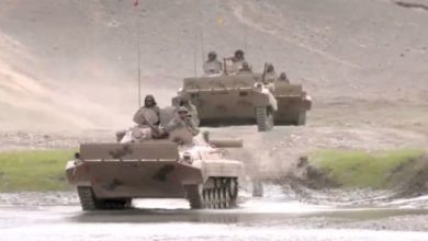 Indian Army tanks carry out drills of crossing the Indus River in the eastern Ladakh